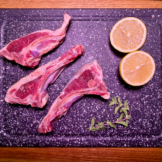 3 lamb chops out of a pack of 6 from Chengwatana Community Farms, part of the Large Organic Grass Fed Lamb Lovers box.