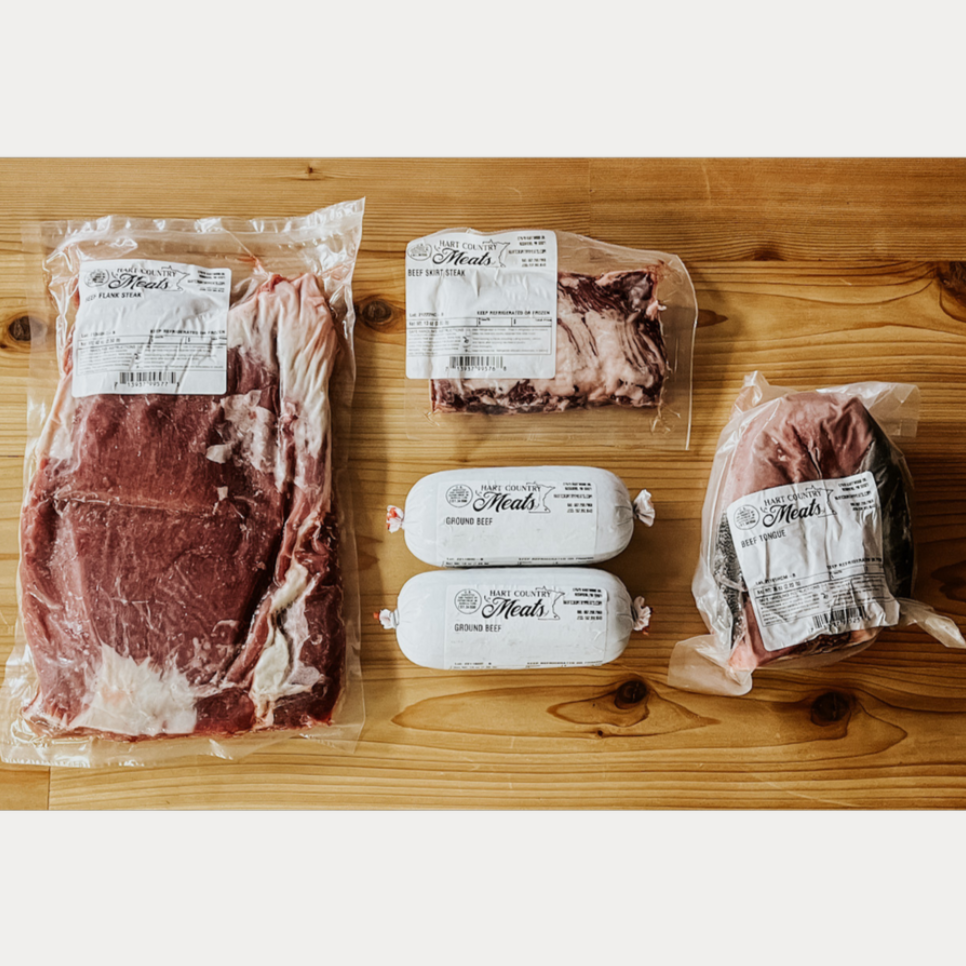 Contents of the Amos Los Tacos Box from Hart Country Meats, consisting of 1 Flank Steak, 1 Skirt Steak, 2 Ground Beef, and, optionally, 1 Beef Tongue