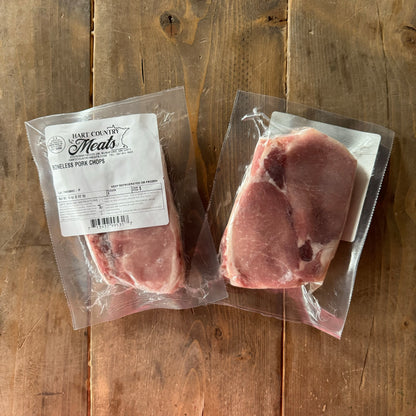 A close up example of the contents of the Boneless Pork Chops Box from Hart Country Meats. Two 2-packs of boneless pork chops.