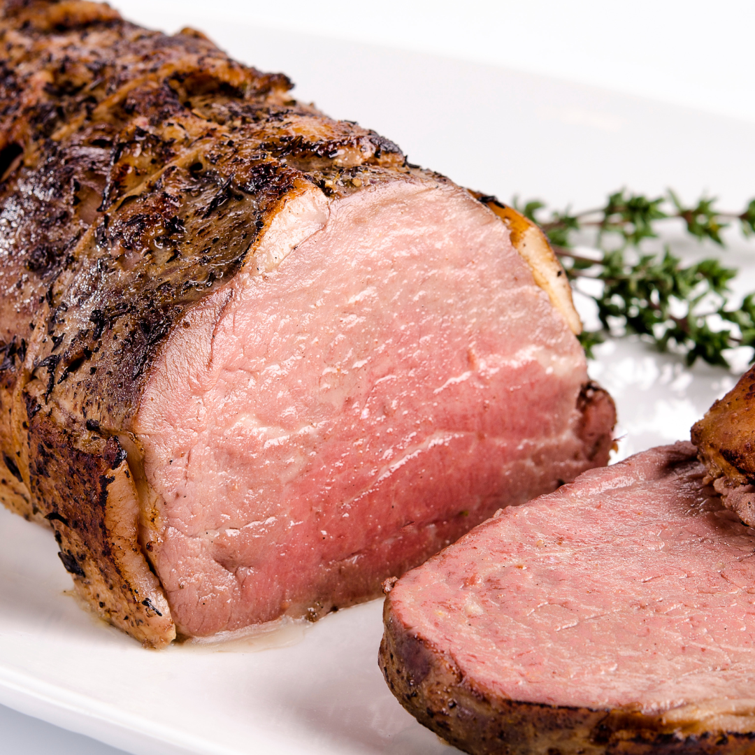 A sliced beef tenderloin, included as part of the Hart Table with Beef Tenderloin Box from Hart Country Meats