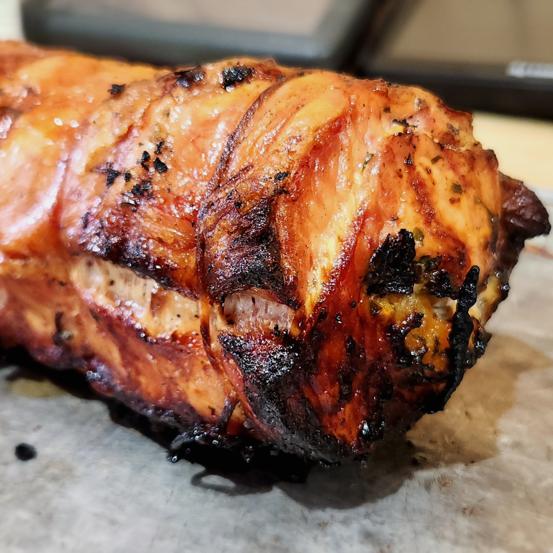 A cooked stuffed pork loin, the contents of this box, from Hart Country Meats.