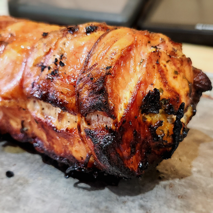 A cooked stuffed pork loin, the contents of this box, from Hart Country Meats.