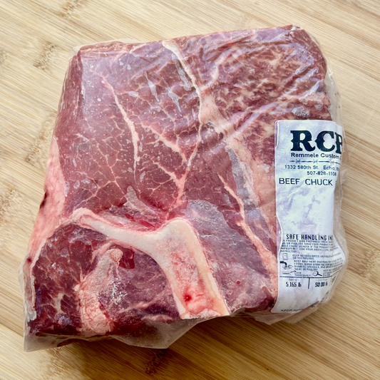 Packaged wagyu cross beef chuck roast from Remmele Custom Beef on a cutting board